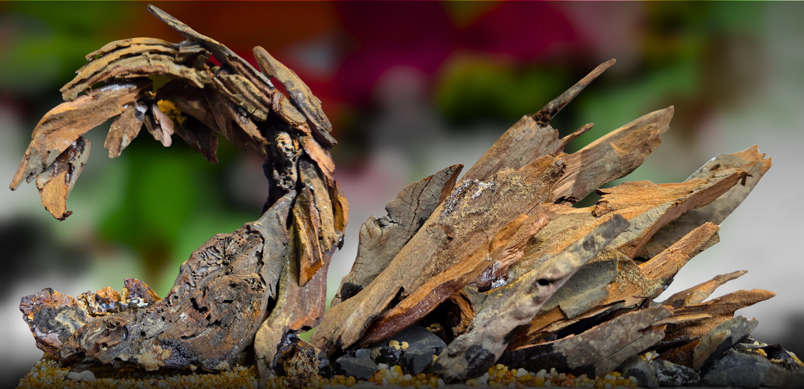 Artistic handcrafted hardscape featuring sculptural driftwood and natural wood formations arranged with rocks and substrate. This unique aquascaping hardscape creates a dramatic nature-inspired focal point for planted aquariums, freshwater aquascapes, and decorative landscape displays.